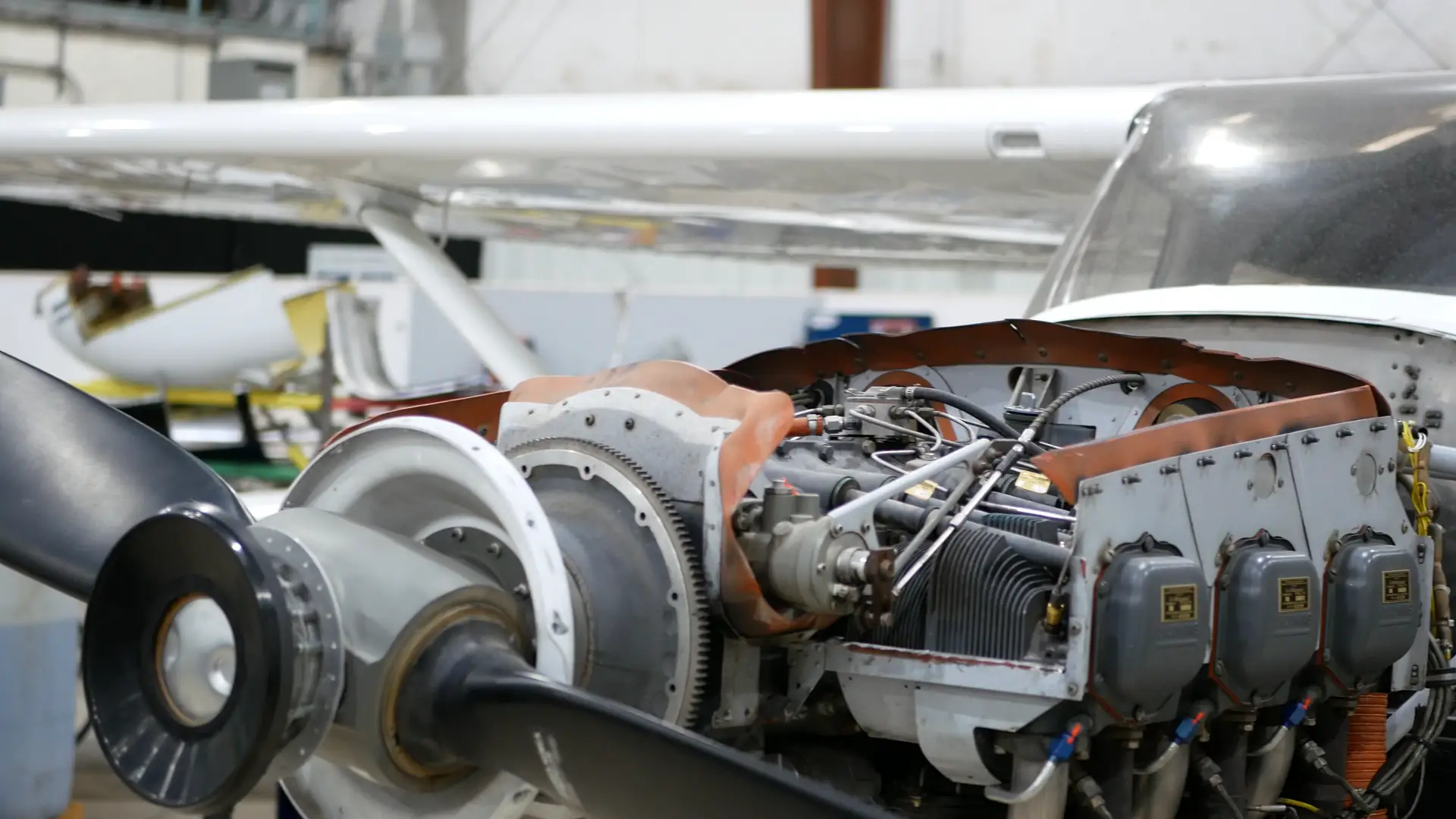 Exposed piston aircraft engine prepared for inspection at Vegas Aviation in North Las Vegas